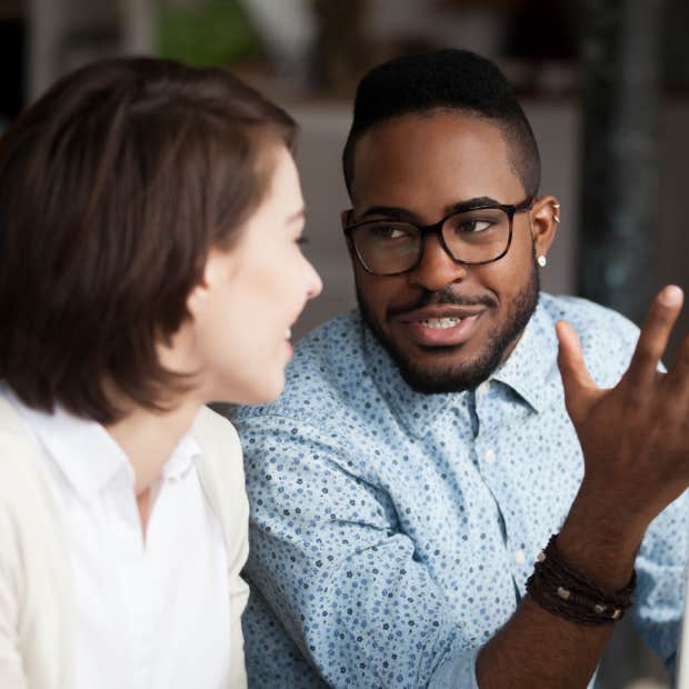 man and woman talking