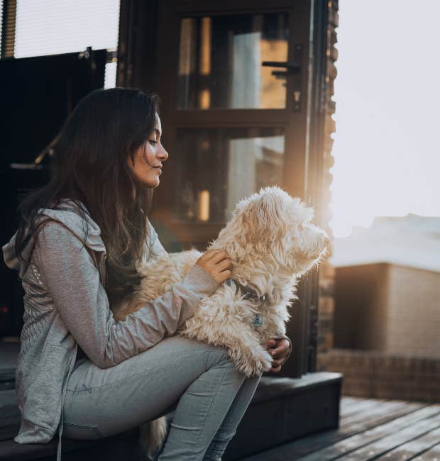 woman wondering if she should consider behavioral euthanasia for aggressive dog