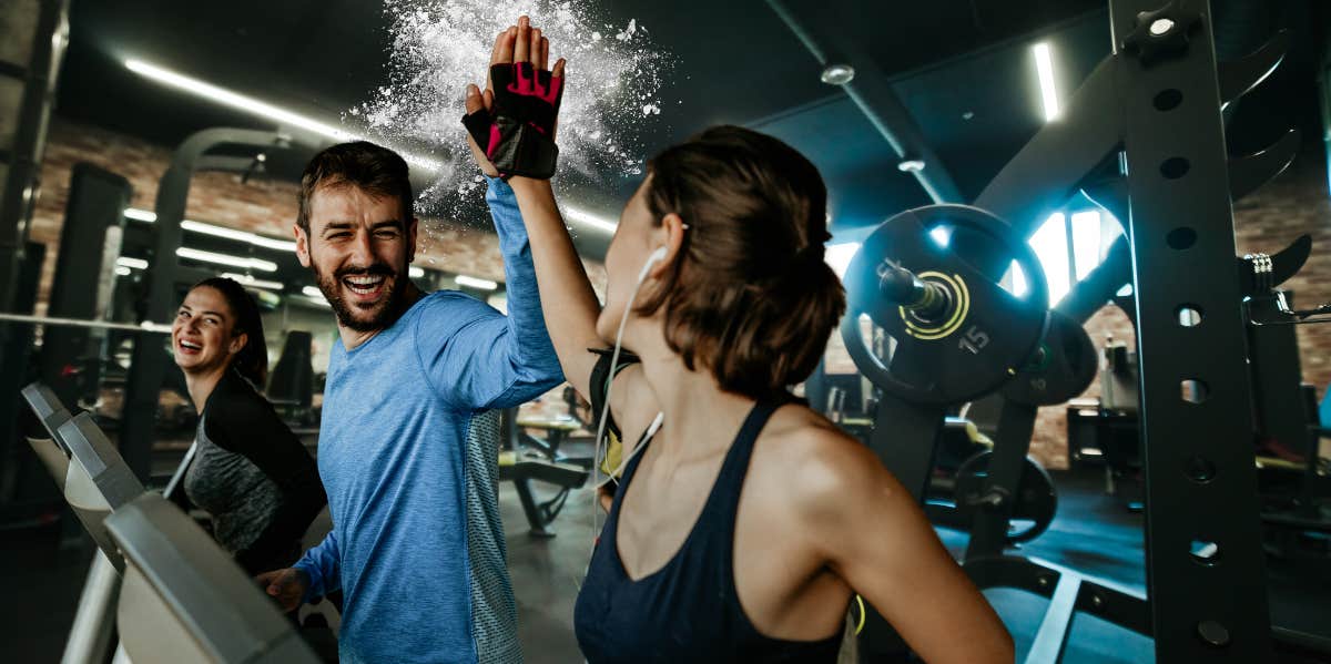 Research Says If Your Spouse Is Cheating, It’s Most Likely With These 5 People man at gym, becoming friendly with female treadmill neighbors