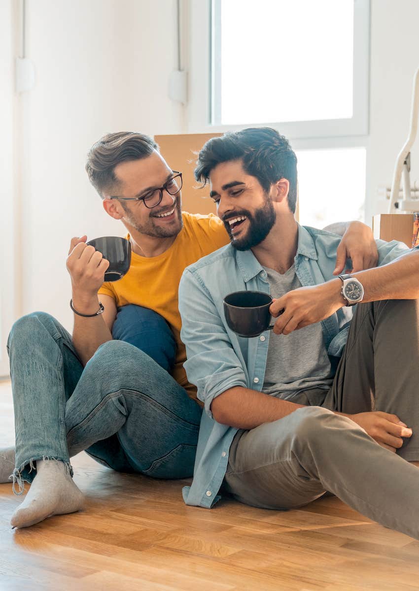 two men enjoy coffee and conversation