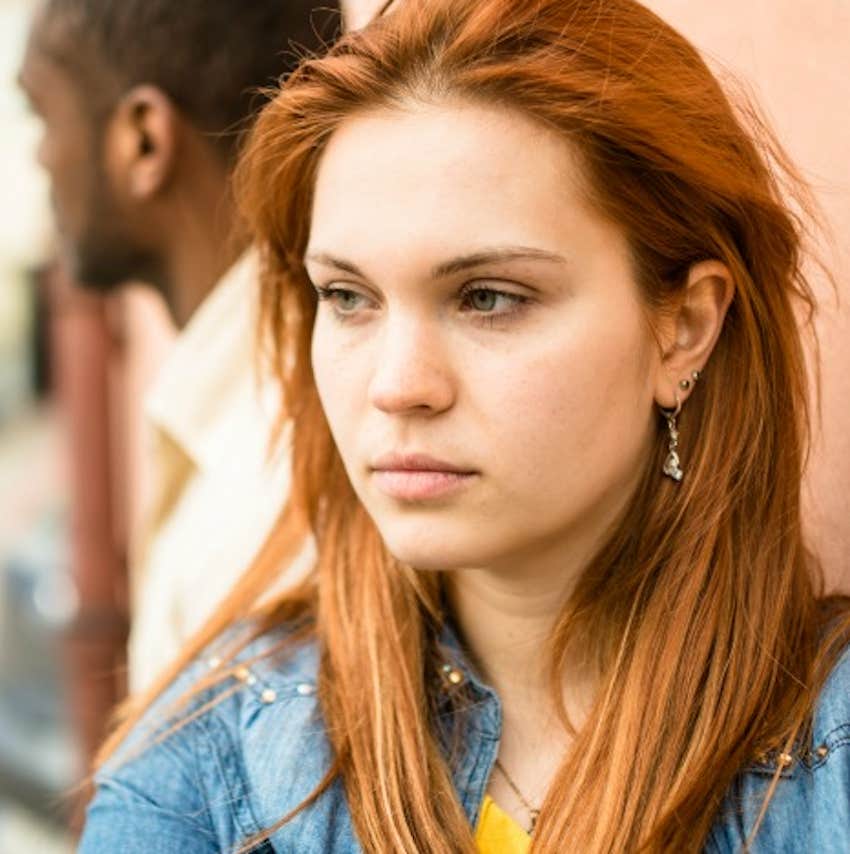 tension between couple looking opposite directions