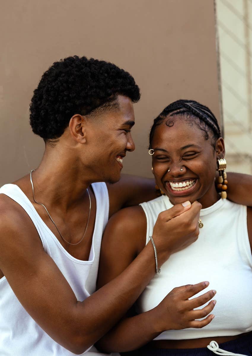 laughing couple share a moment of joy