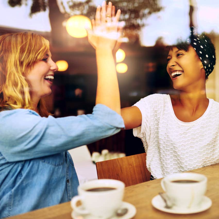 two women celebrating success