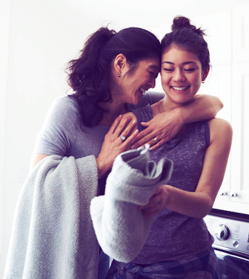 mom and daughter happy doing chores