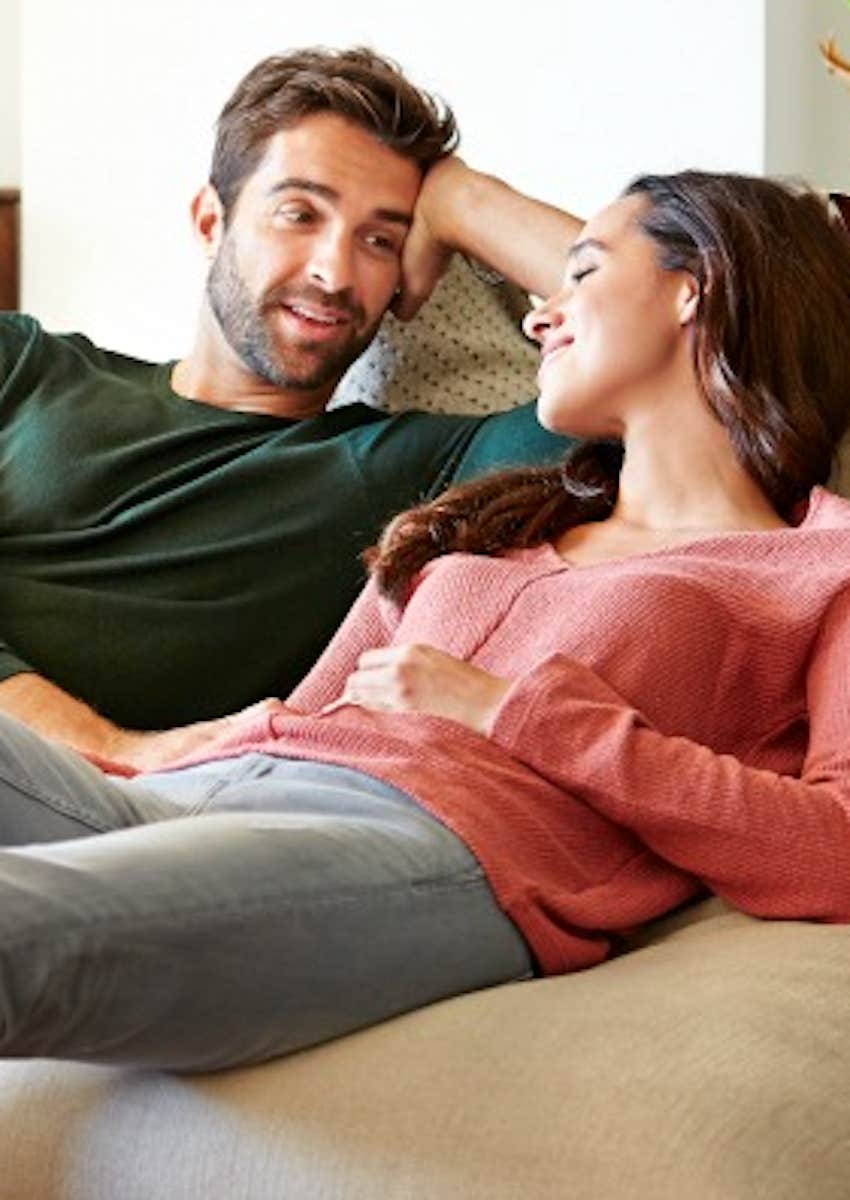 couple chatting on couch