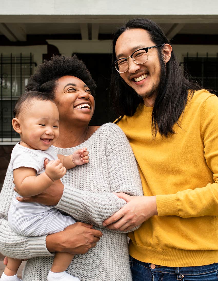 happy parents with baby