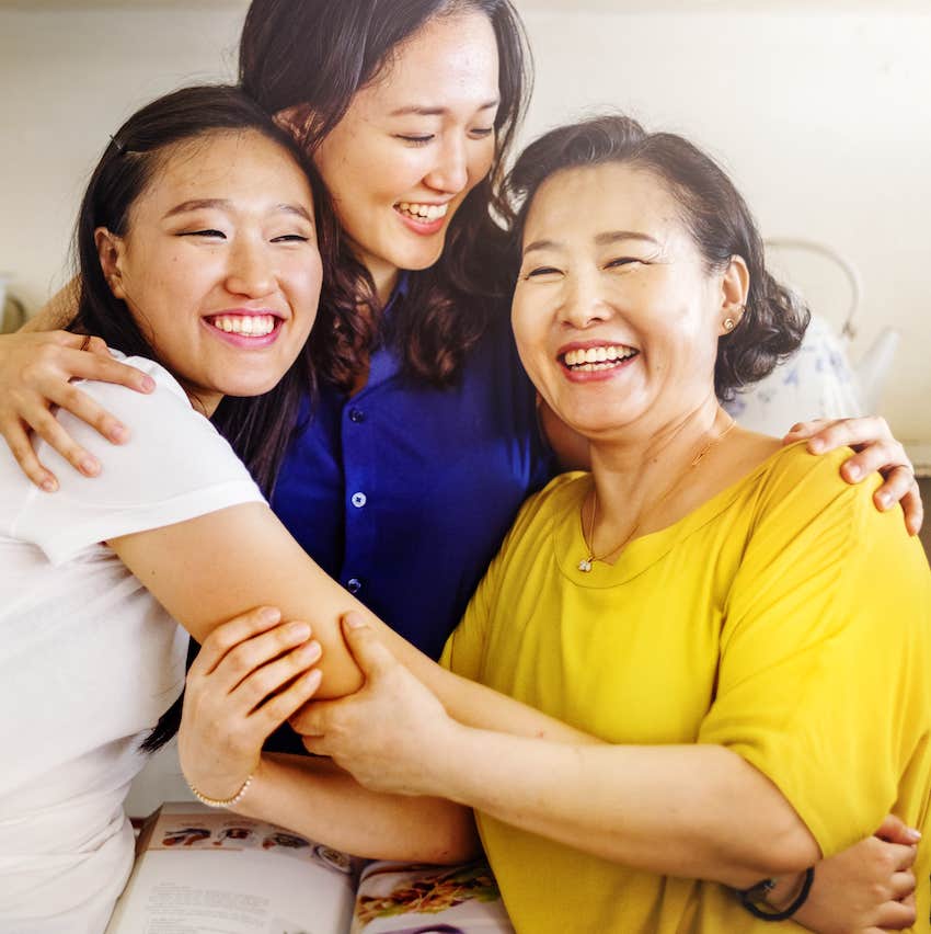 Mothe and adult daughters Happiness Smiling Hug
