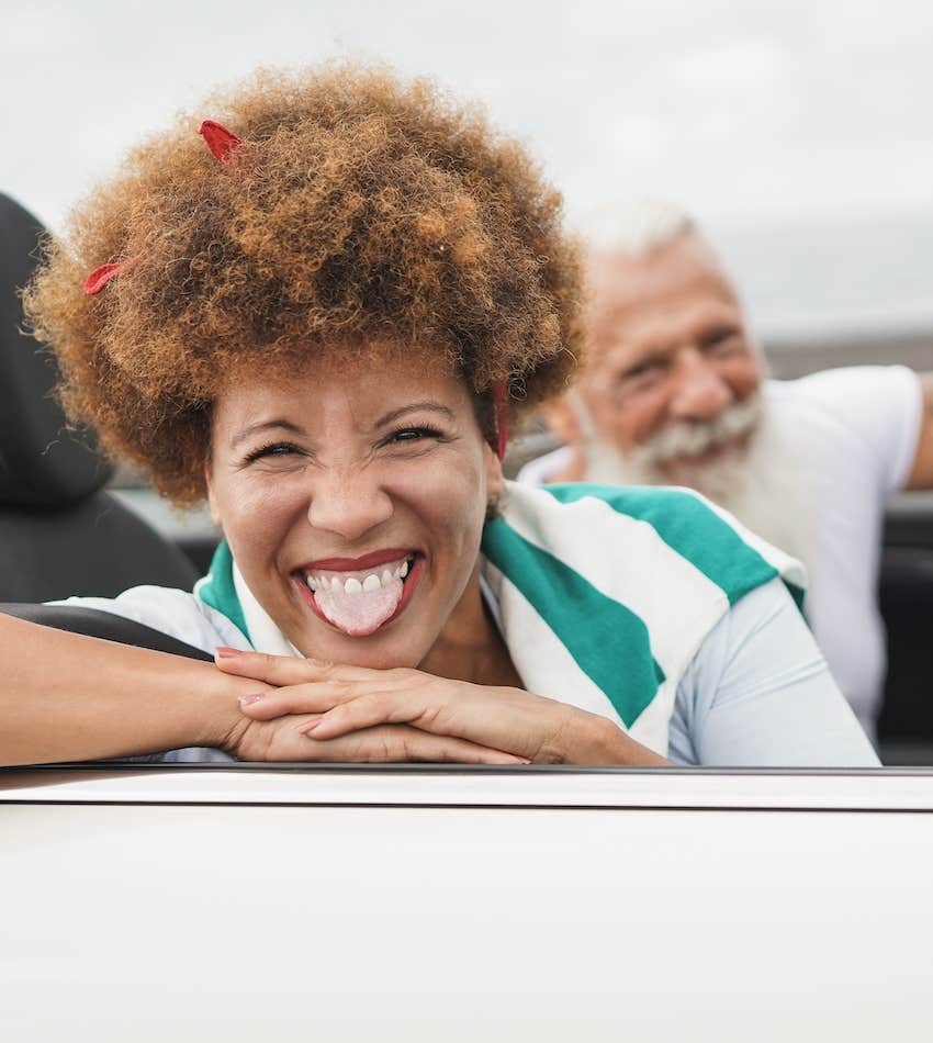 Happy senior couple having fun during road trip 