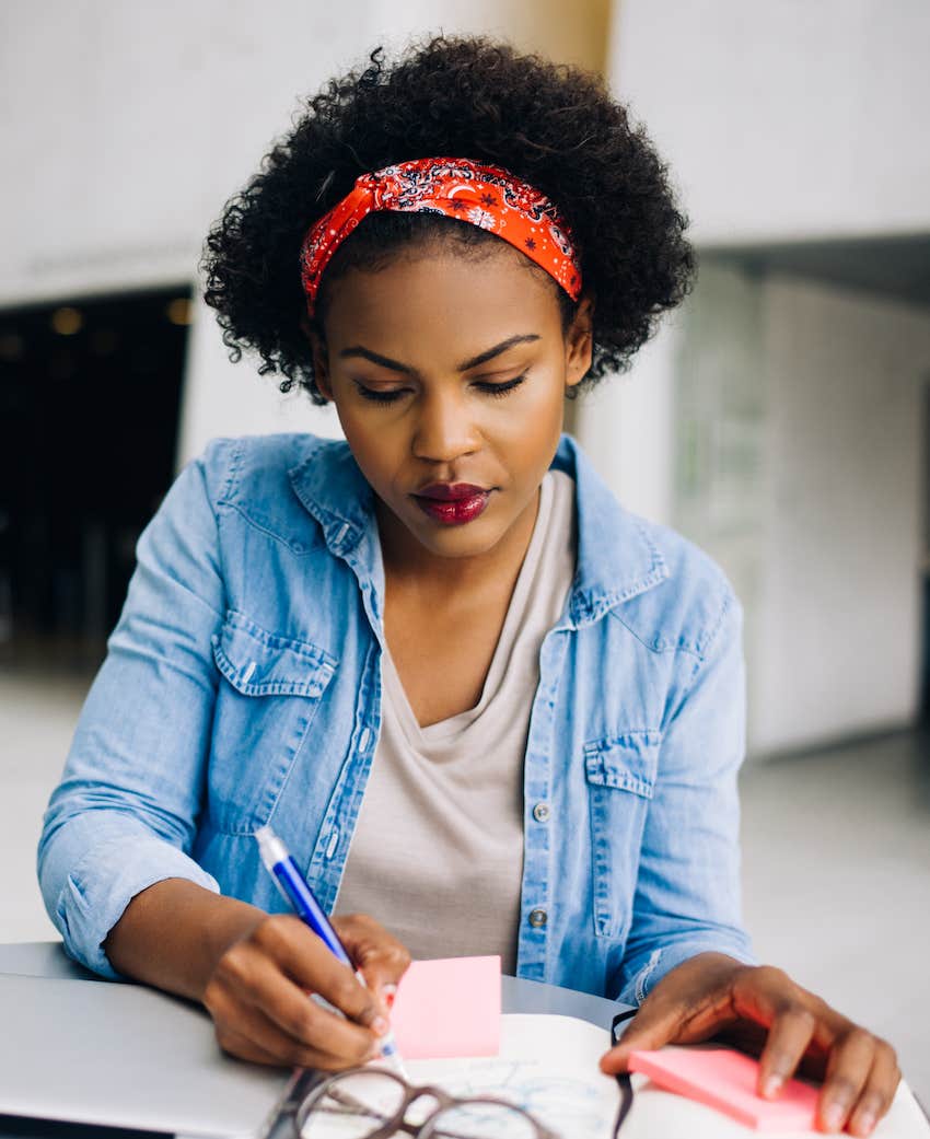 woman focused on working alone