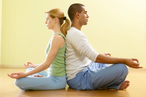 couple meditating together