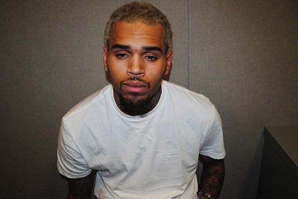 Chris Brown mugshot blond hair losing virginity first time sex