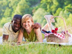 couple lying in the grass 