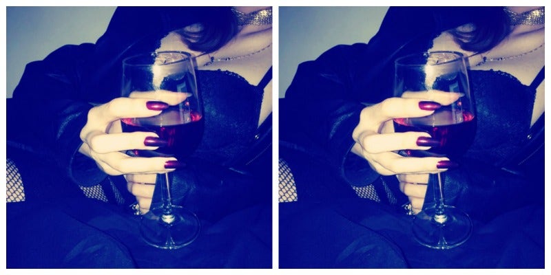woman drinking red wine, an aphrodisiac woman drinking red wine, an aphrodisiac