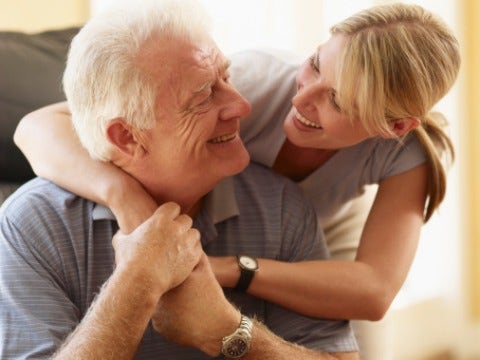 woman hugging father Woman hugging father