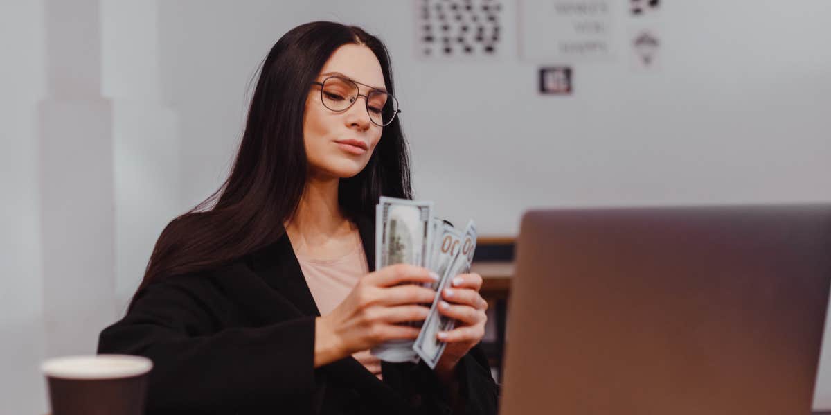 woman counting money