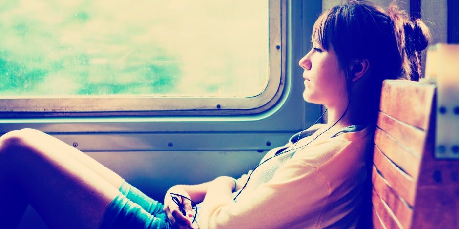 sad woman on a train