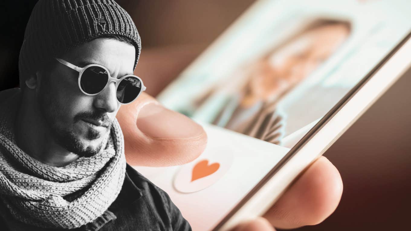 Younger man clicking on older woman’s dating profile 