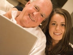 Smiling father and daughter