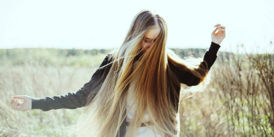 Girl walking in field Left husband to discover self