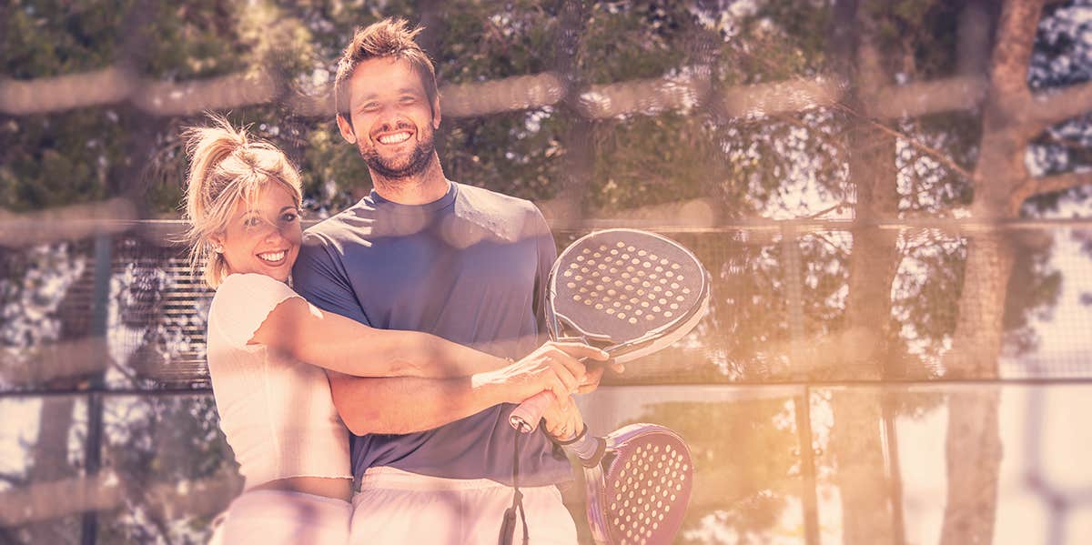 couple playing tennis