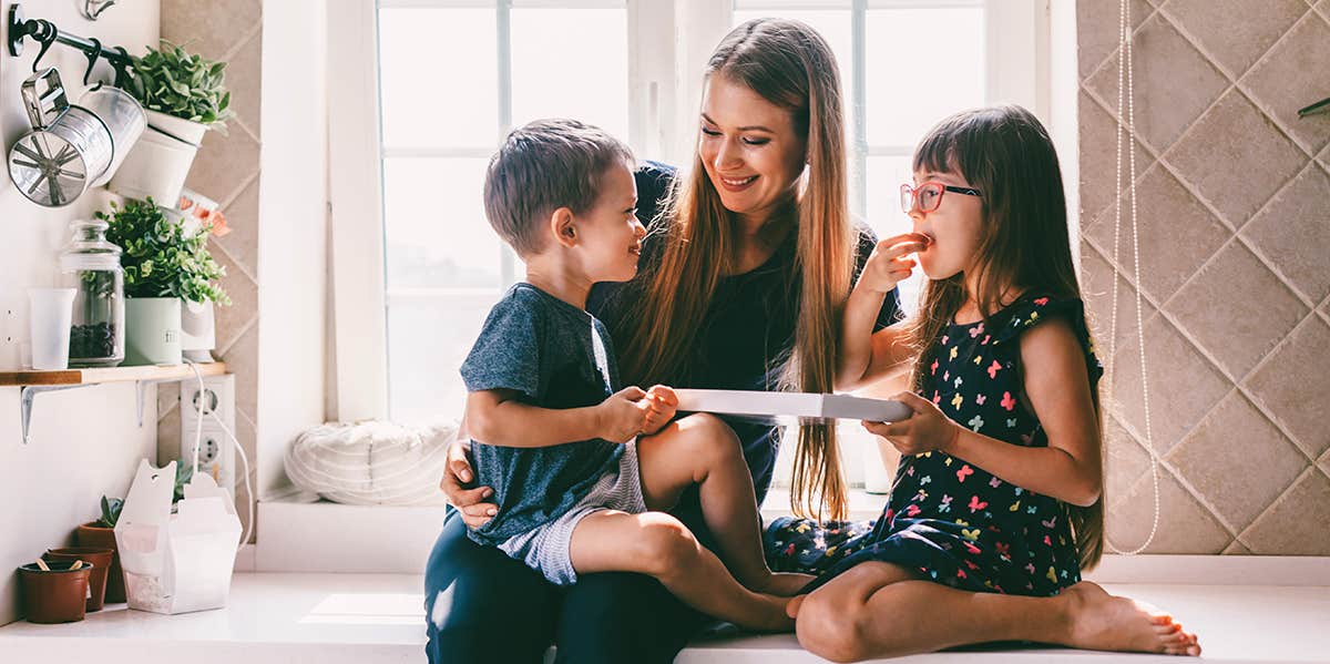 10 Things I Want To Tell My Kids (Before They're Too 'Cool' To Listen) mom and two kids sitting in kitchen