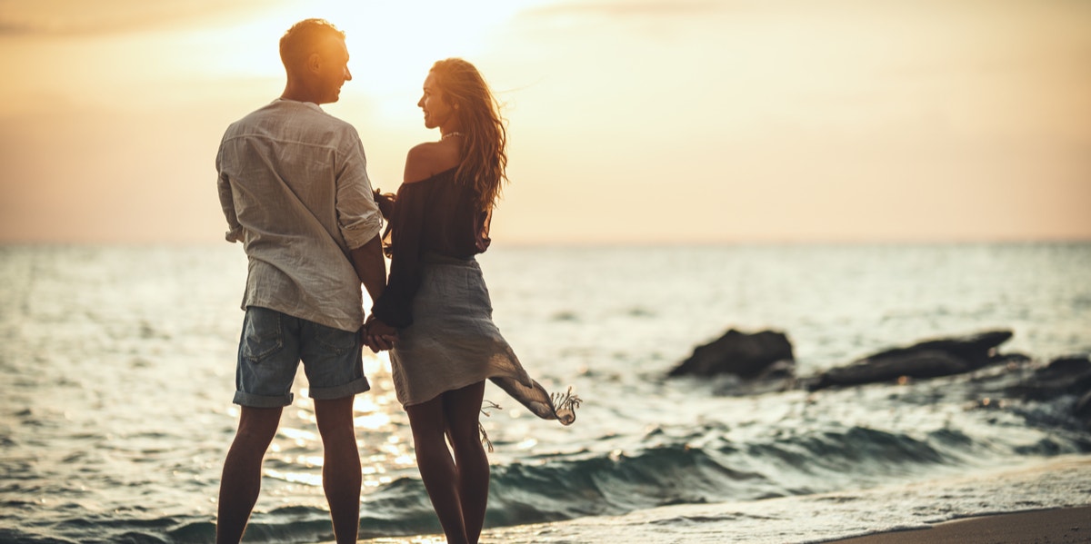 man and woman on beach