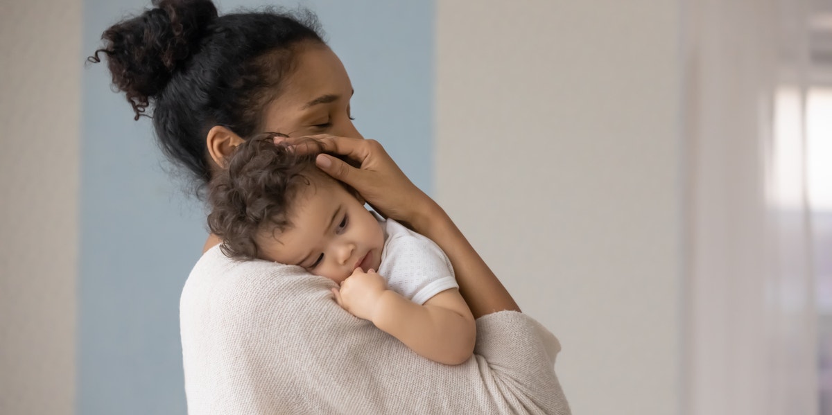 10 Parenting Mistakes You're Probably Making (And How To Fix Them) mom holding baby