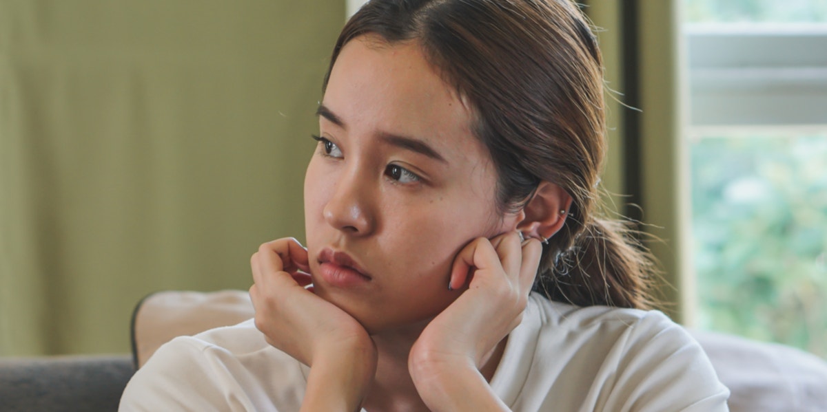 10 Signs You're A People-Pleaser (And It's Sucking The Life Out Of You) unhappy woman