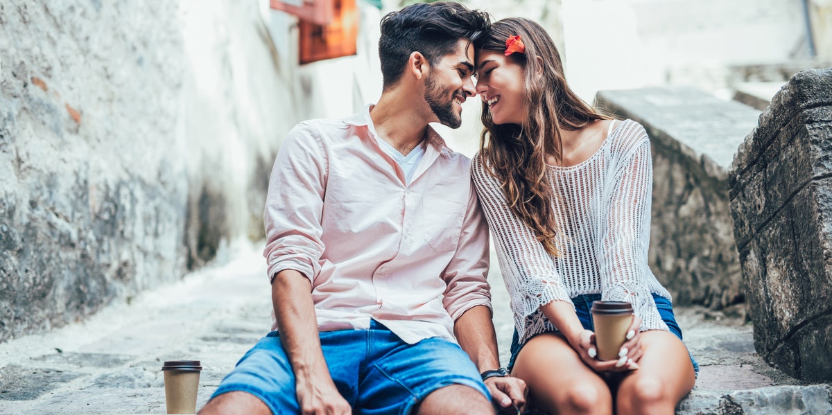 Top 10 Signs You've For Sure Met Your Prince Charming happy couple sitting together