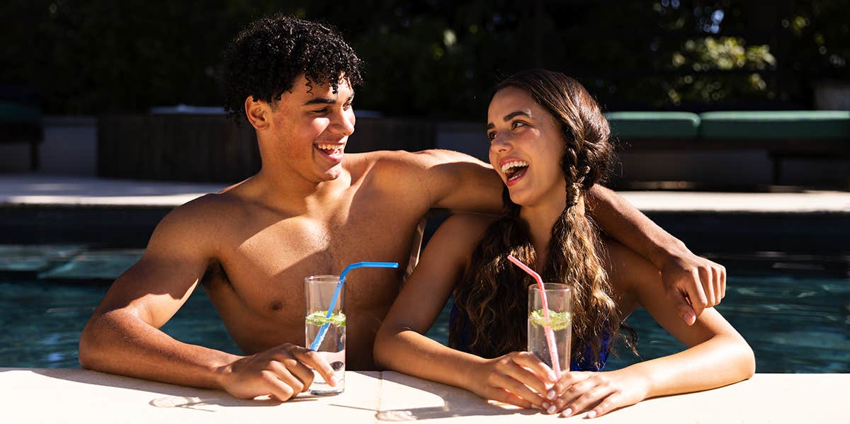 couple laughing at the pool