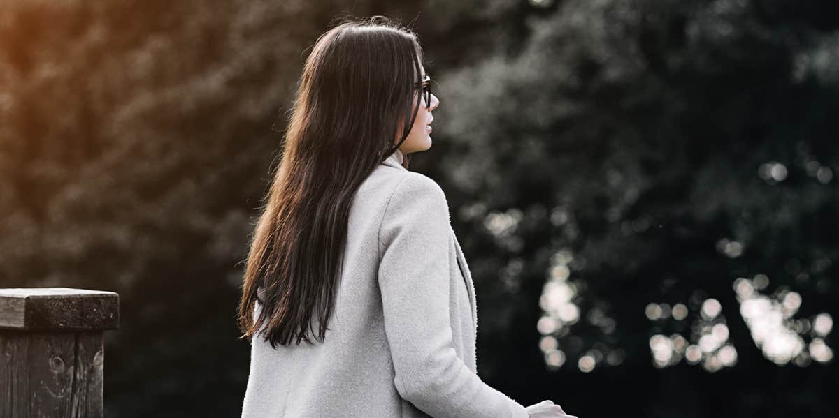 woman standing alone