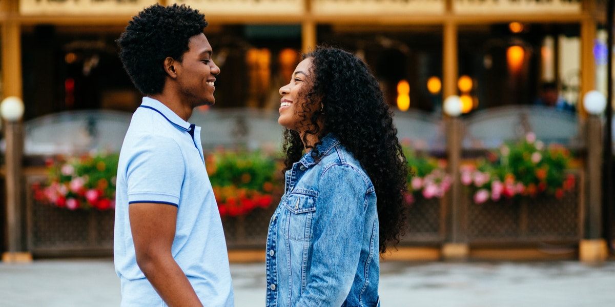 man and woman talking