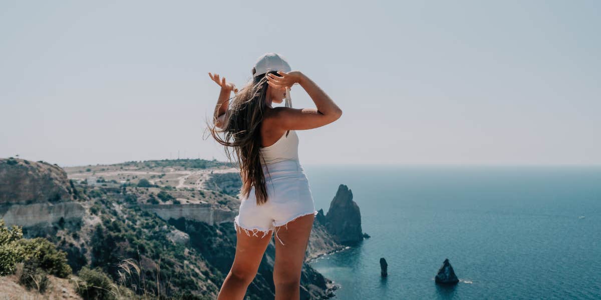 woman overlooking ocean