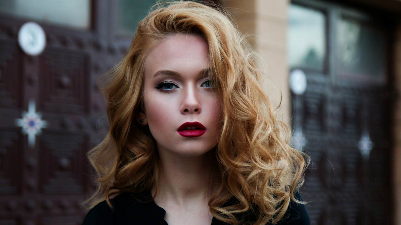 11 Daily Habits Of Highly Polished People a woman with red lipstick and red hair