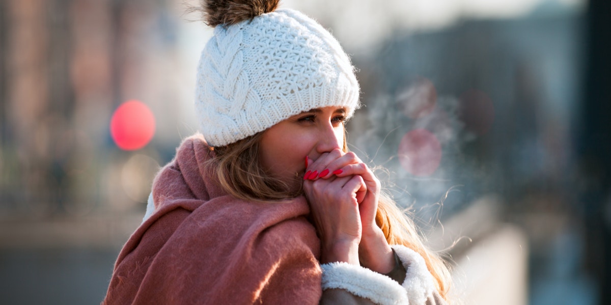 12 Struggles Only People Who Are Always Cold Will Understand woman in cold weather
