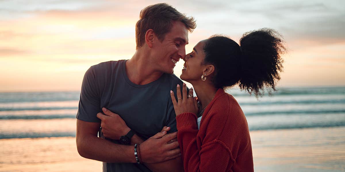 happy couple on the beach together