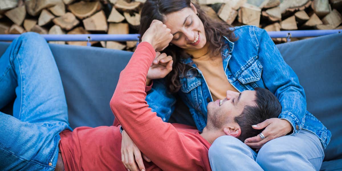 man and woman on outside couch