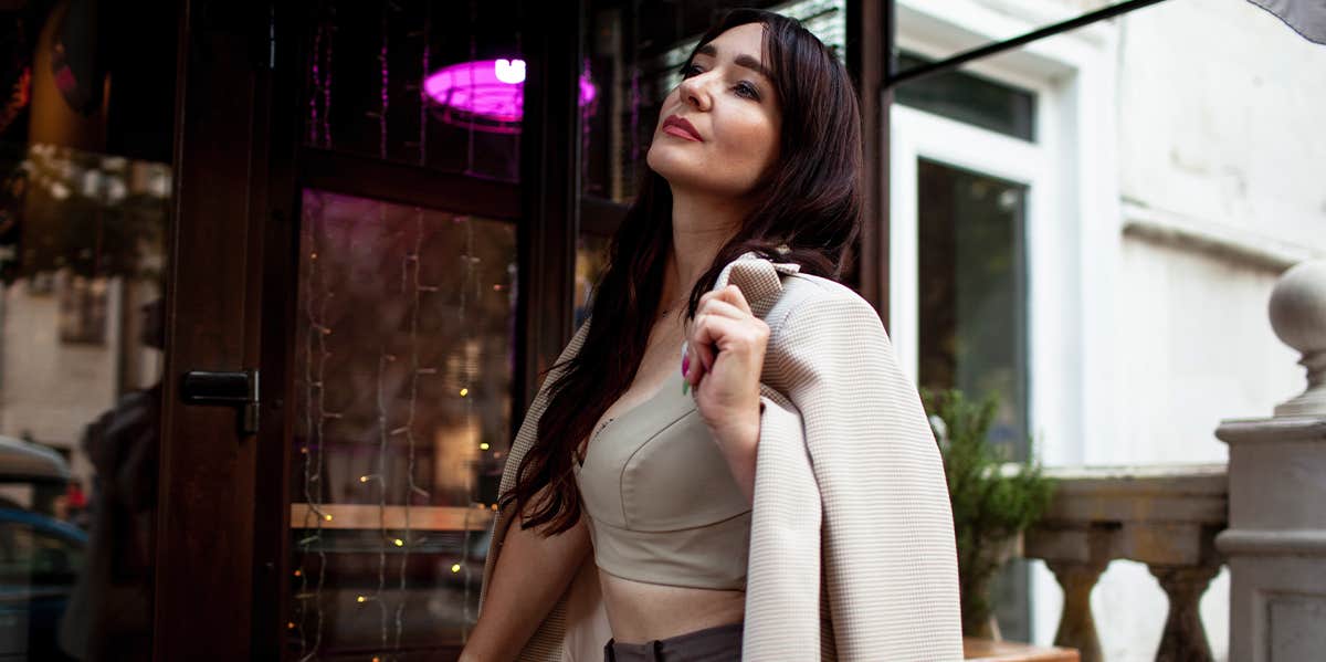 Things Women Do That Men Know Absolutely Nothing About woman carrying jacket over her shoulder