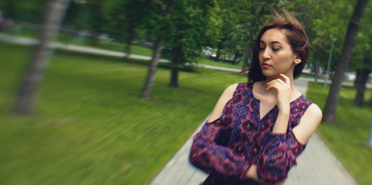 Uplifting Facts About Breakups That Will Instantly Make You Feel Better woman in park