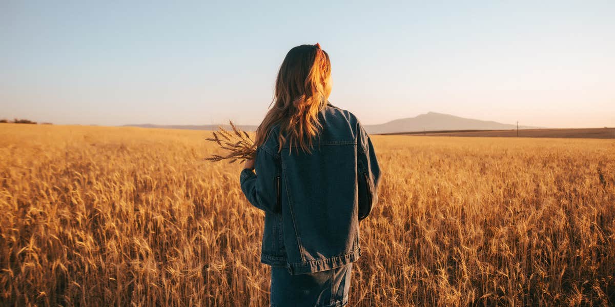 woman alone in field