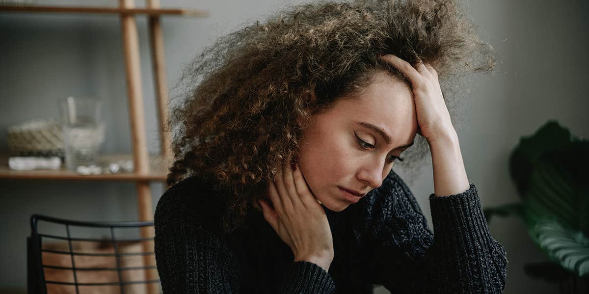Things Only People Who Suppress Their Feelings Understand woman with hand on head