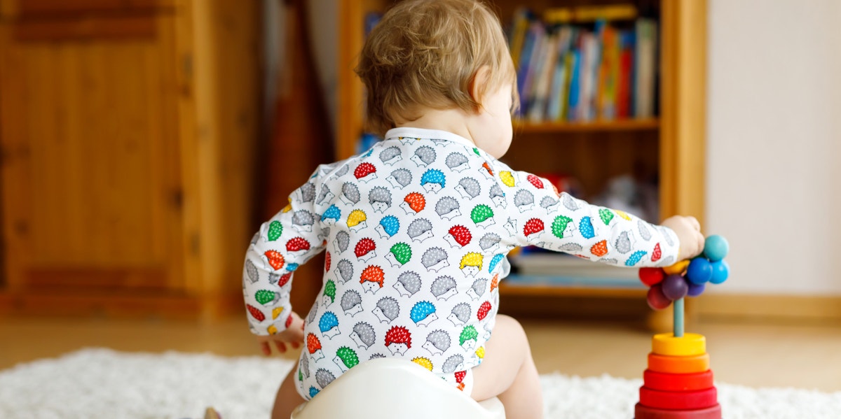 toddler playing in room