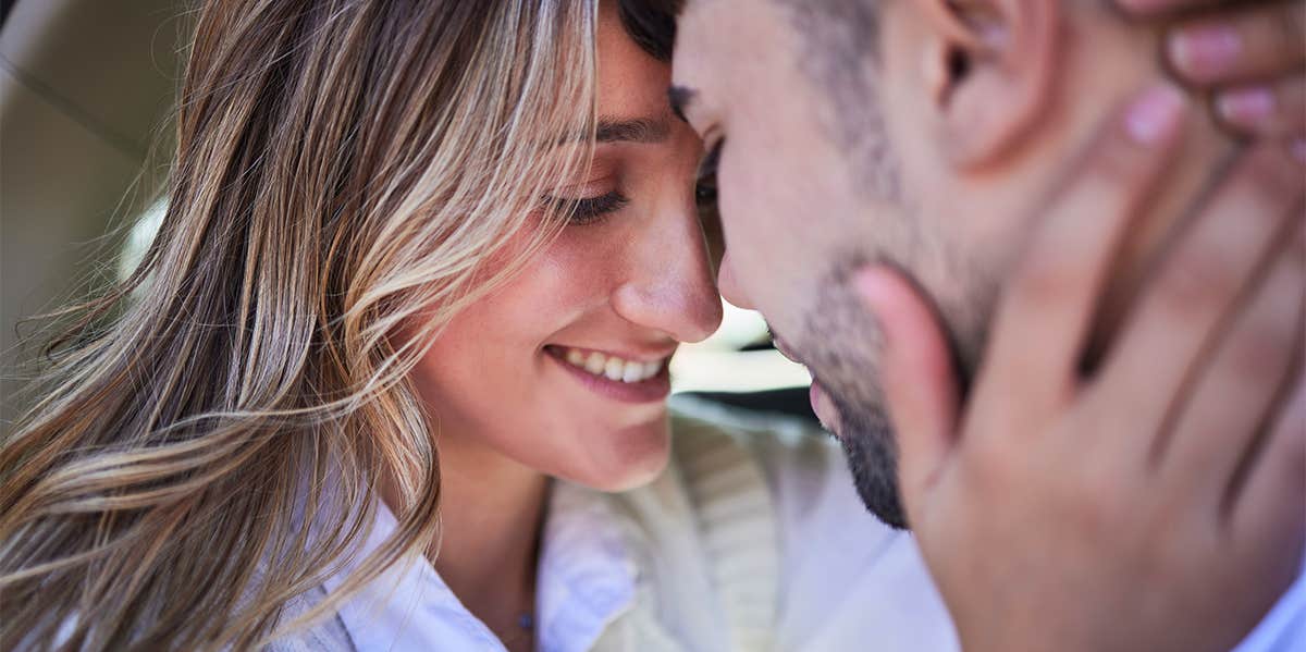 woman and man embracing