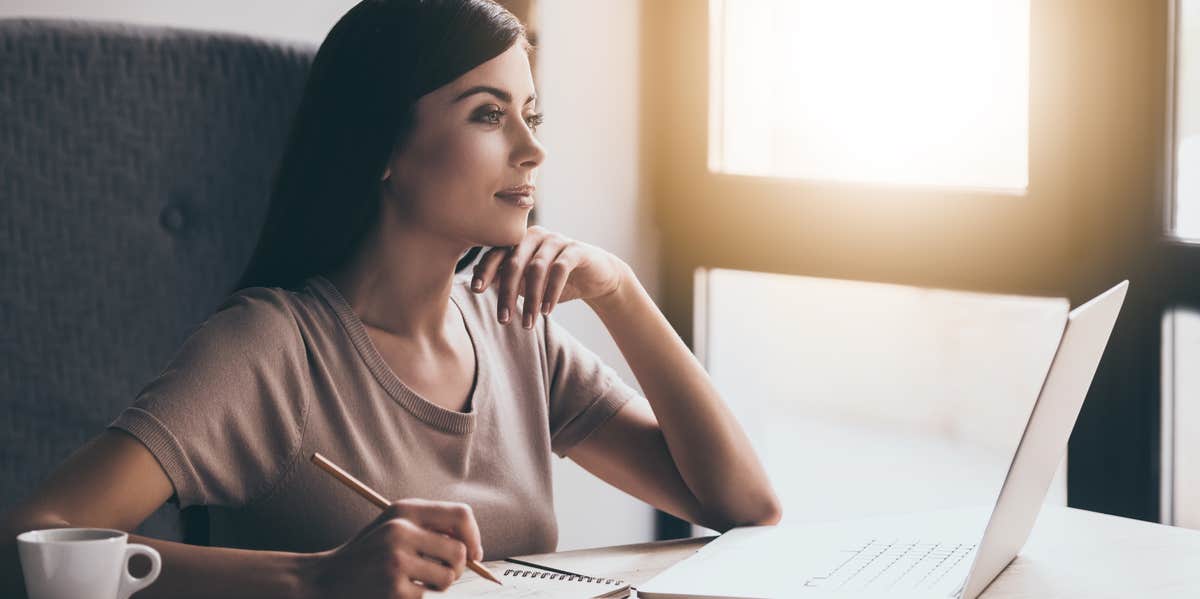 woman thinking at desk