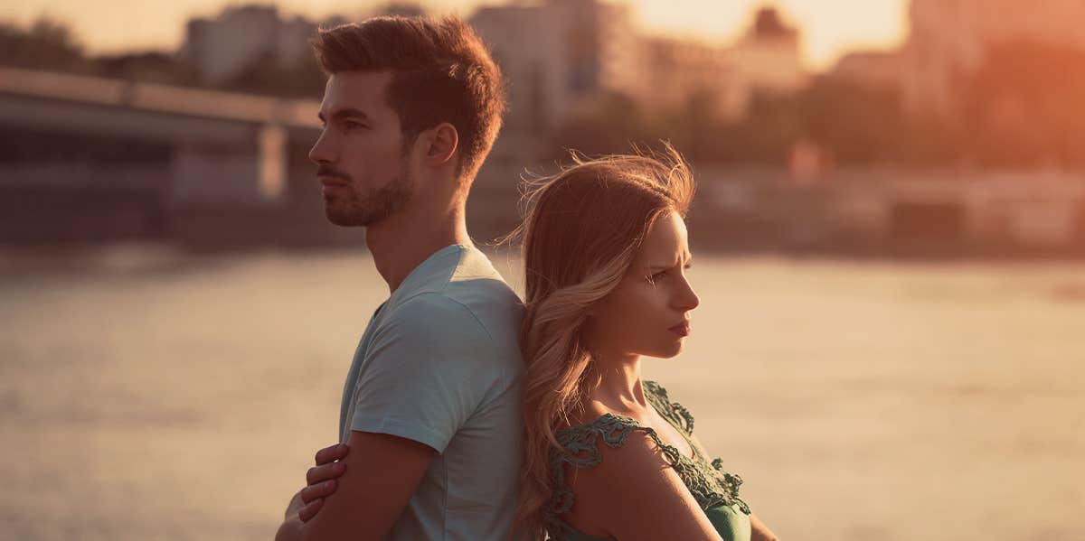 There's Only 2 Critical Tips For Fighting Fair In Relationships couple standing back to back