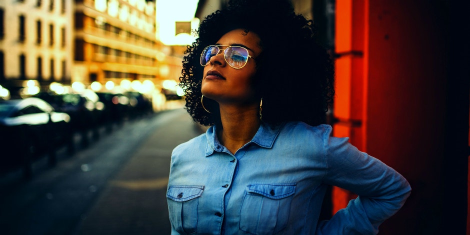 photo of woman looking into sky