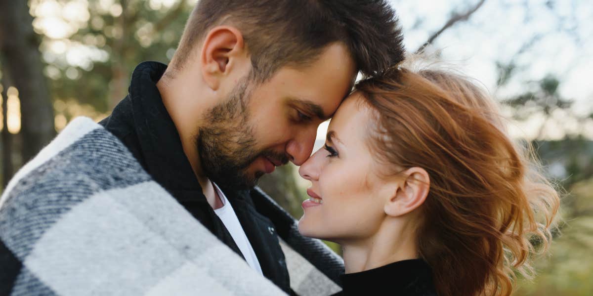 20 Couples Reveal What They've Done To Make Their Marriage Last This Long man and woman embracing