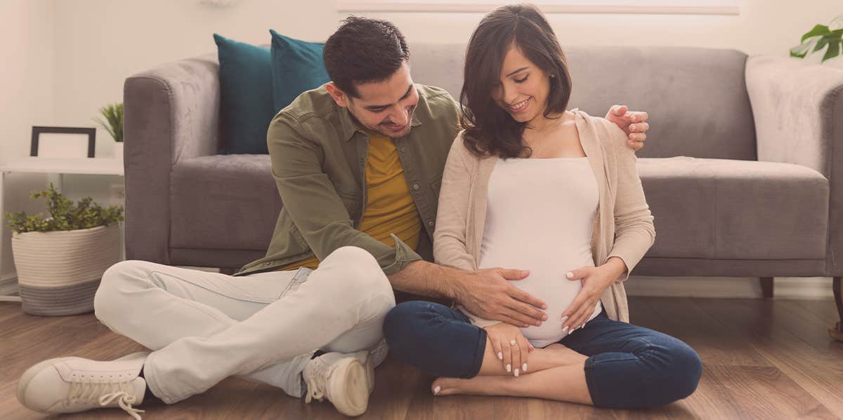 20 Old Wives Tales To Predict Your Baby's Gender man touching the stomach of a pregnant woman