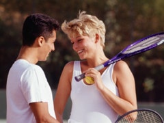 Play Together: Top Sports For Couples couple playing tennis