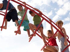 Marriage And Multiples: Surviving 3 Sets Of Twins kids on monkey bars